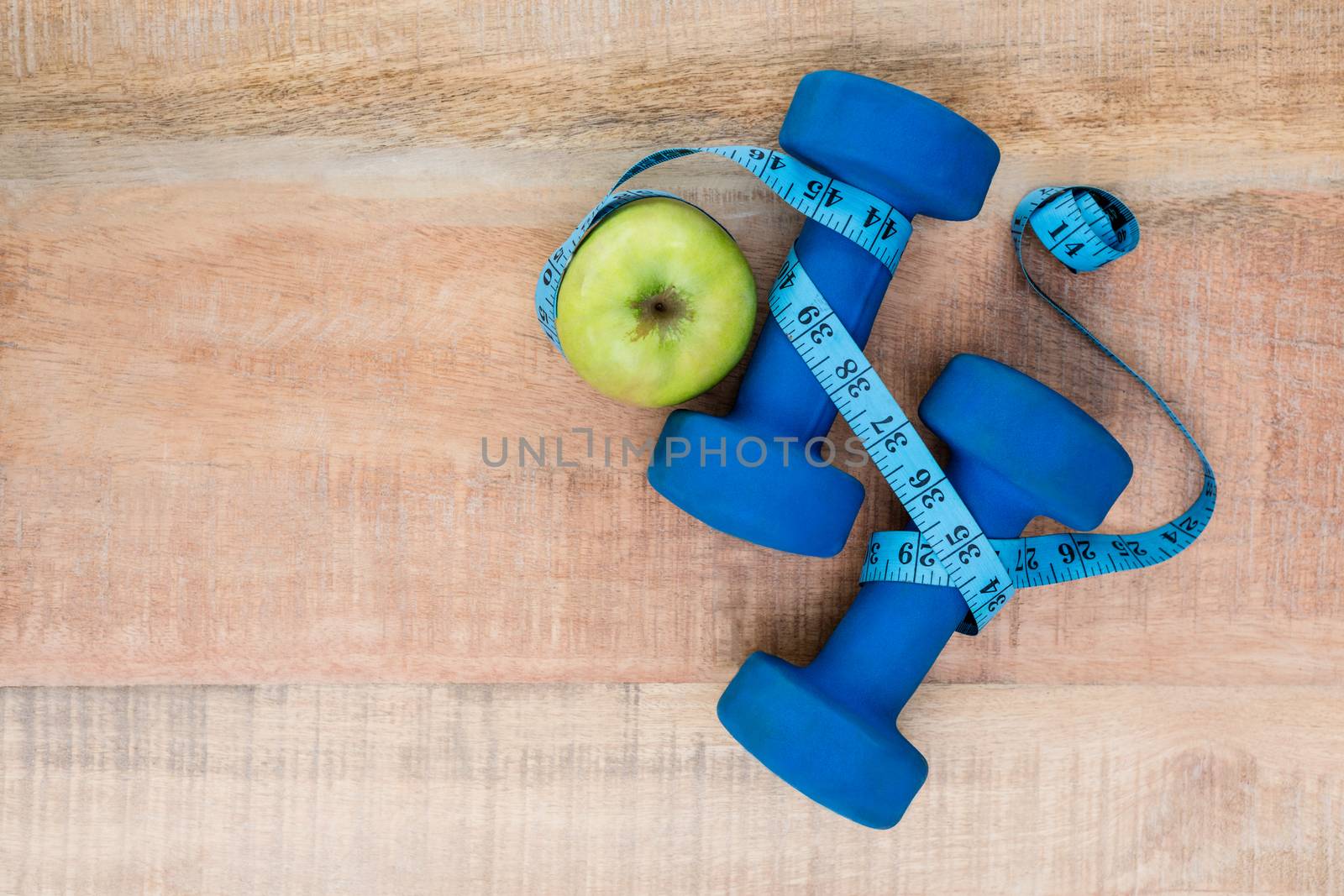 Ingredients for a healthy lifestyle on wooden table