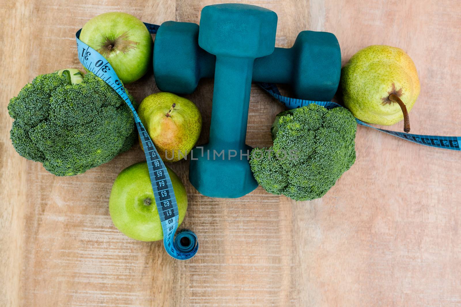Ingredients for a healthy lifestyle on wooden table