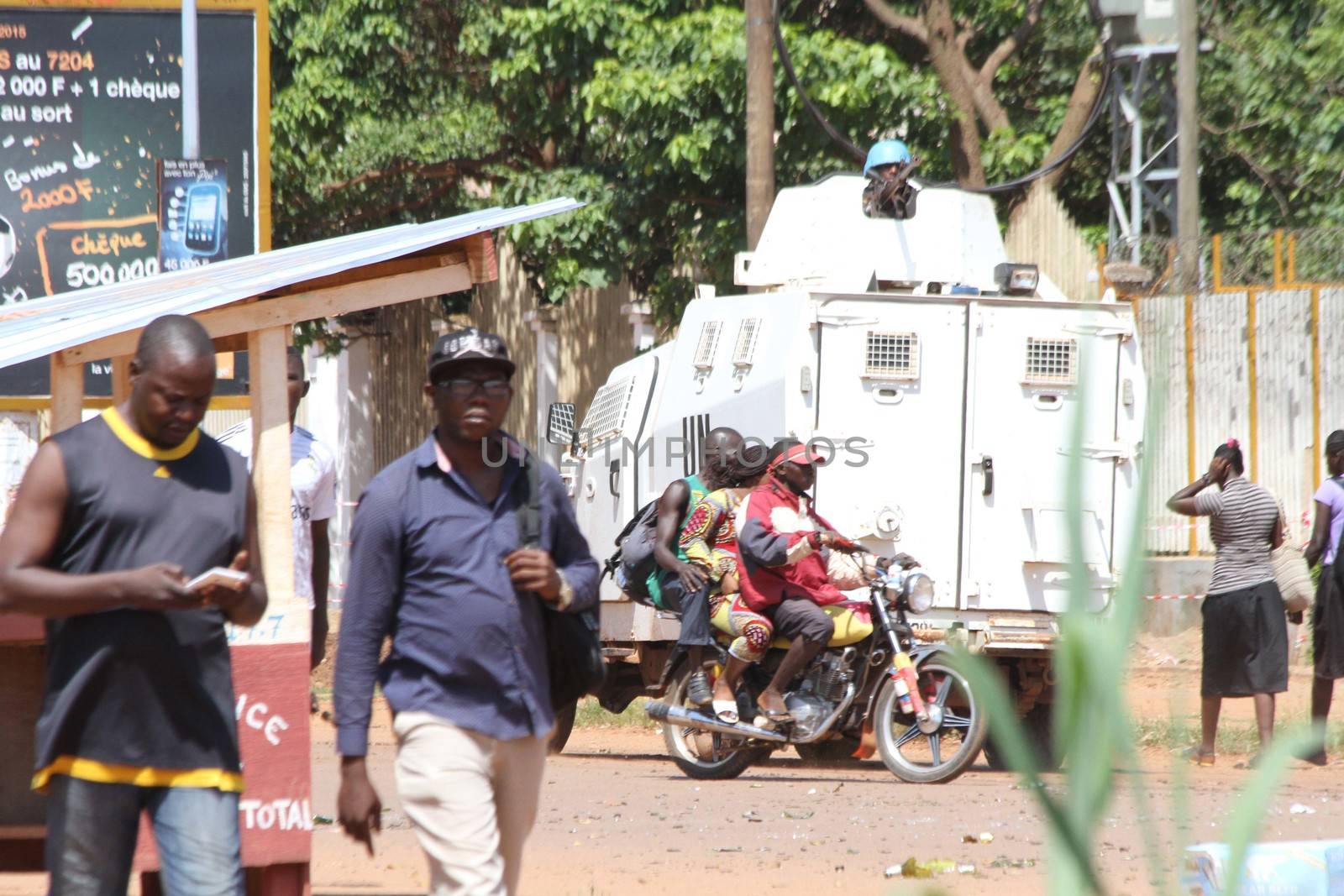 CENTRAL AFRICAN REPUBLIC, Bangui  : Soldiers of the United Nations Multidimensional Stabilization Mission in Central African Republic, Minusca, passe on a street in Bangui, as they patrol in the city, on October 27, 2015,  after protesters attacked and plundered Muslim houses and shops in the aftermath of the murder of at least one clean water delivery man, on October 26. The Central African Republic descended into bloodshed on last September, more than two years ago after long time president Francois Bozize, a Christian, was ousted by Seleka rebels, triggering the worst crisis since independence in 1960. 