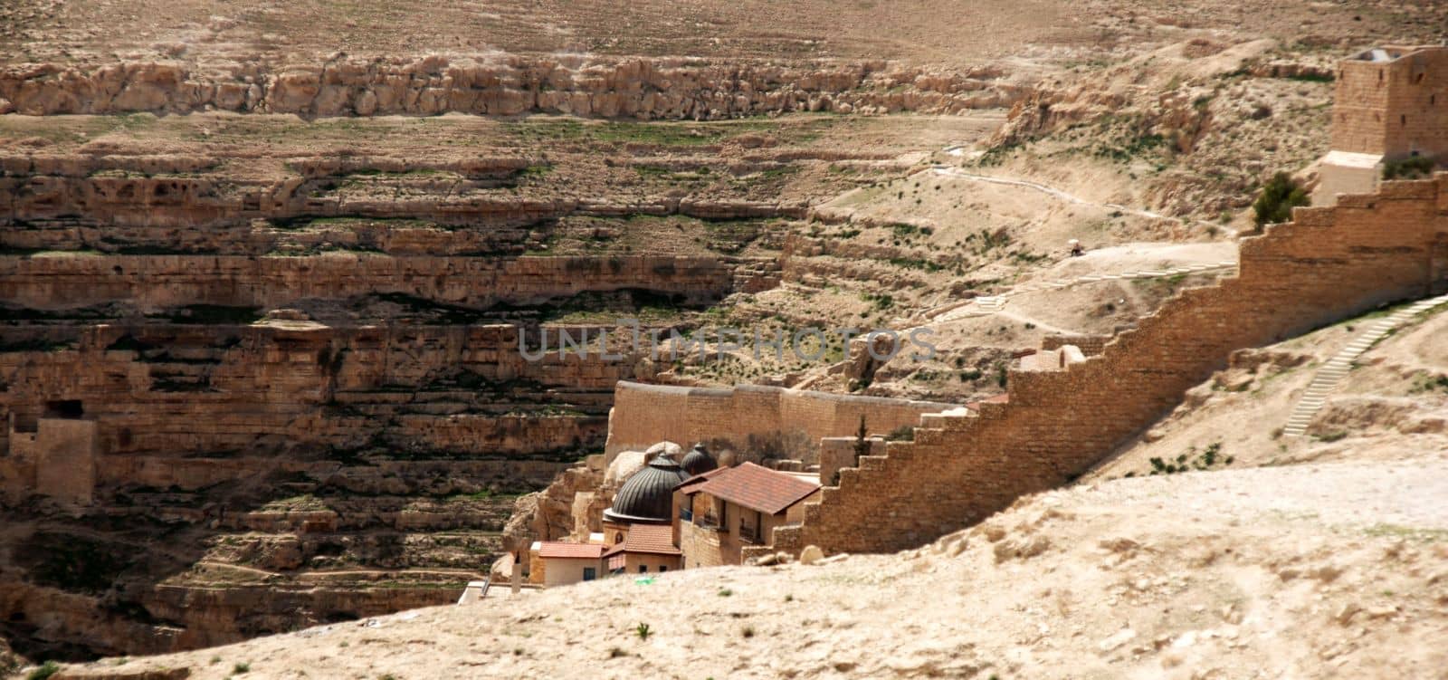 travel at spring in judean desert for hermits caves and monk monastery