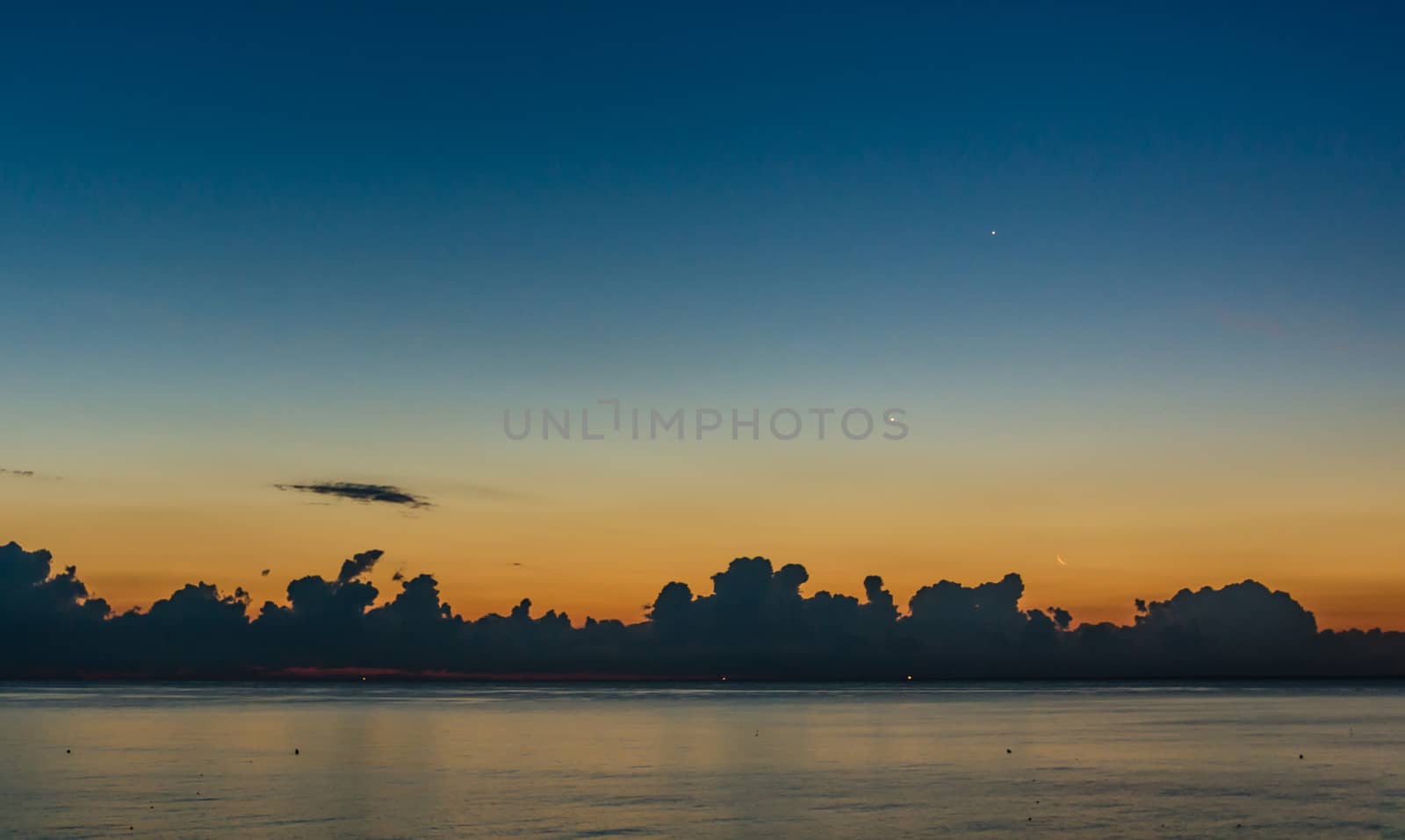 Cloudy dawn at sea by rarrarorro