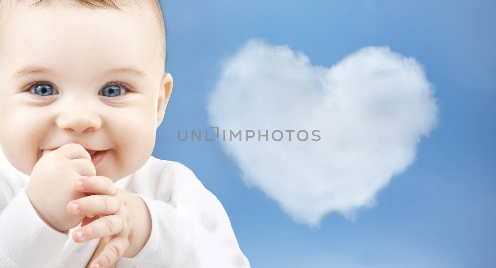 child, happiness and people concept - adorable baby