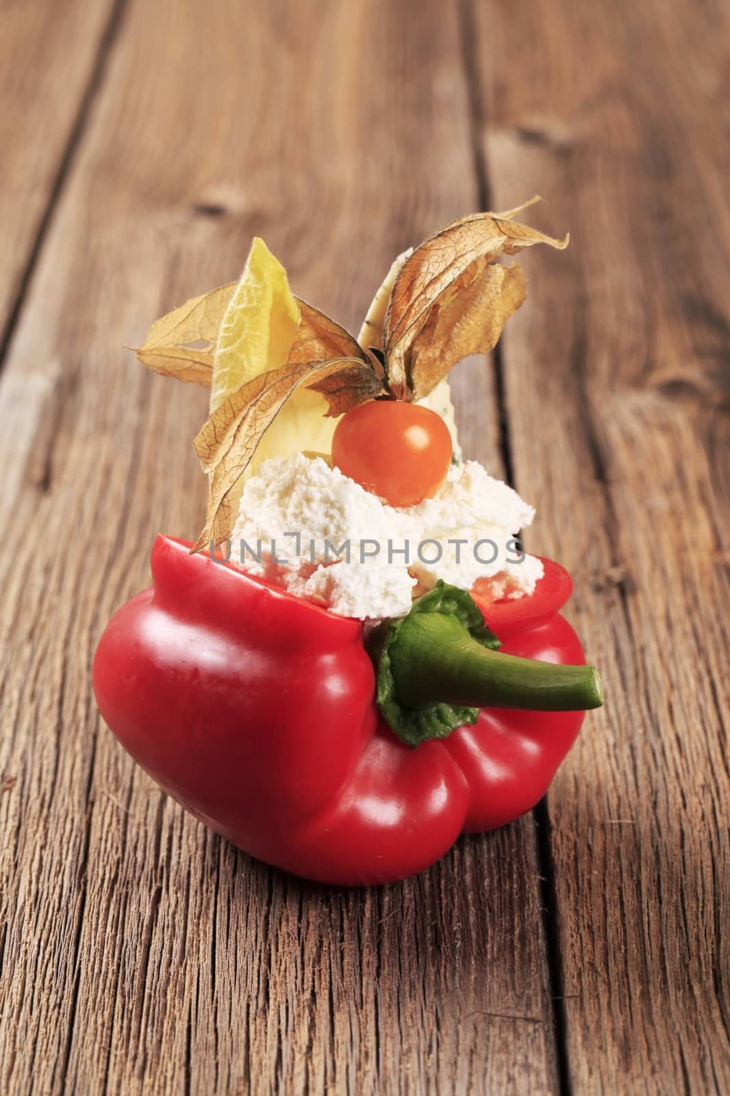Red bell pepper filled with curd cheese