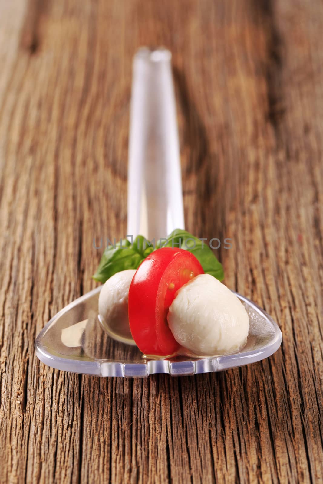 Mozzarella cheese balls and tomato by Digifoodstock