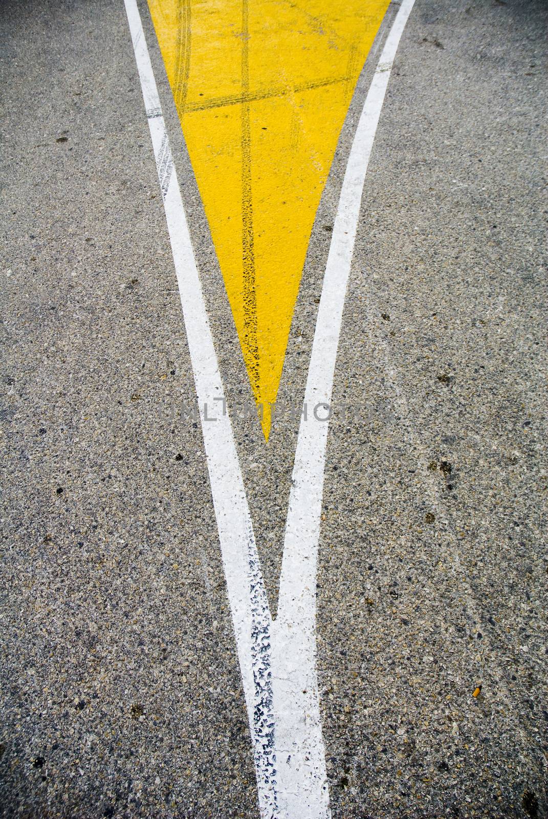 Road split sign painted on the road