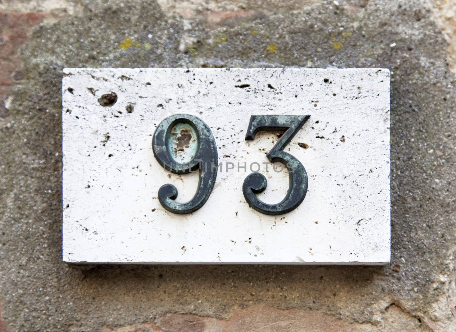 Block number on a wall  by Digifoodstock