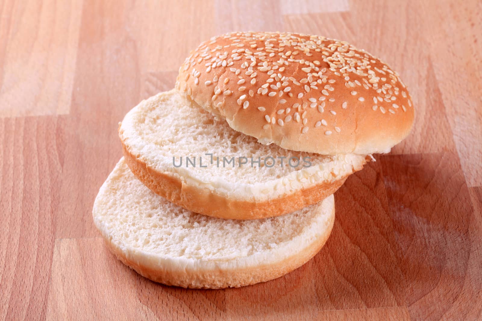Slices of sesame seed bun - ready for hamburger