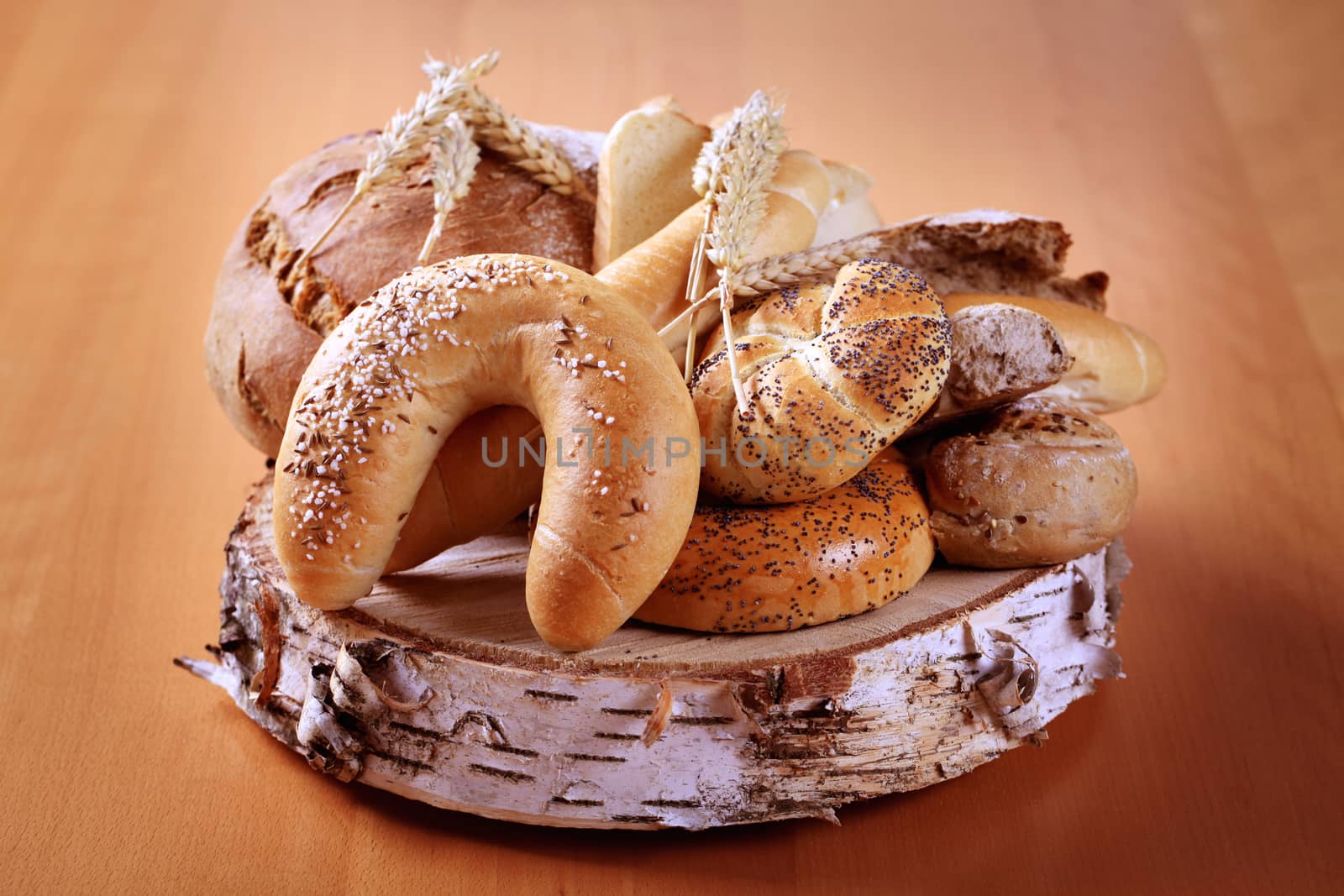 Variety of fresh bread and rolls by Digifoodstock