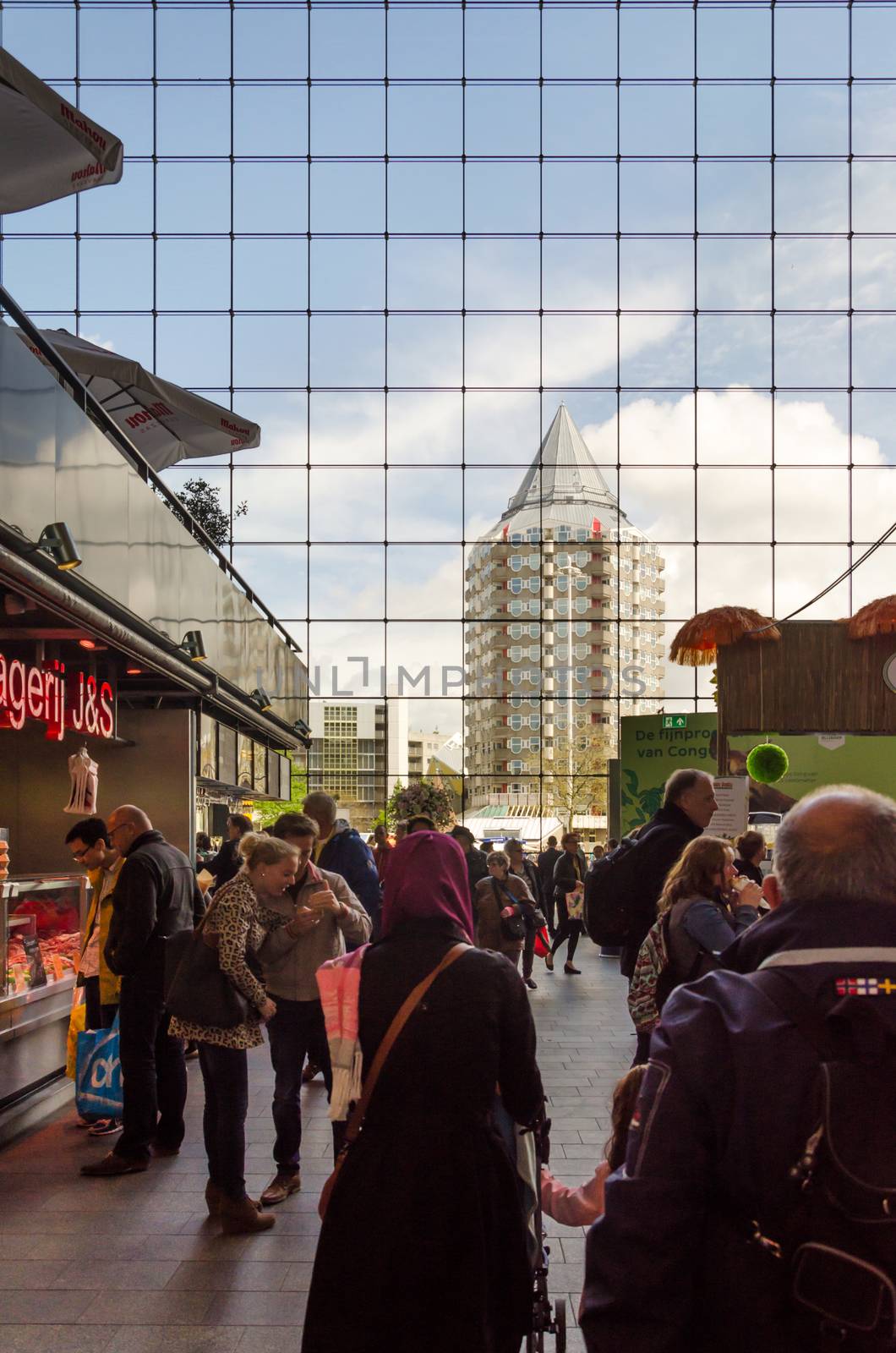 Rotterdam, Netherlands - May 9, 2015: People visit Markthal (Market hall) in Rotterdam by siraanamwong