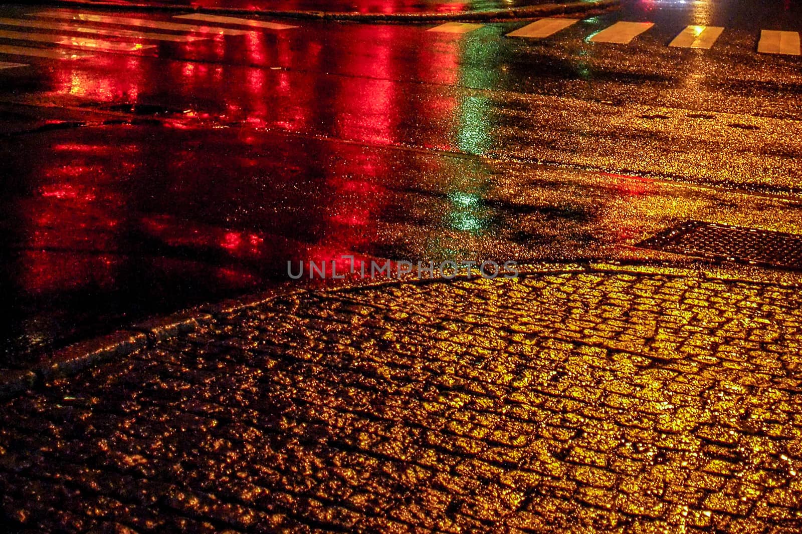 Street ground at night after rain.