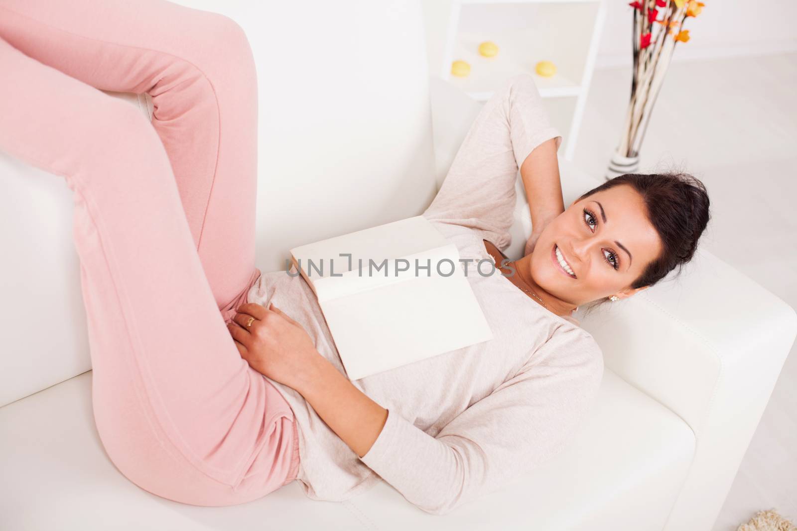 Beautiful young woman Relaxing at home