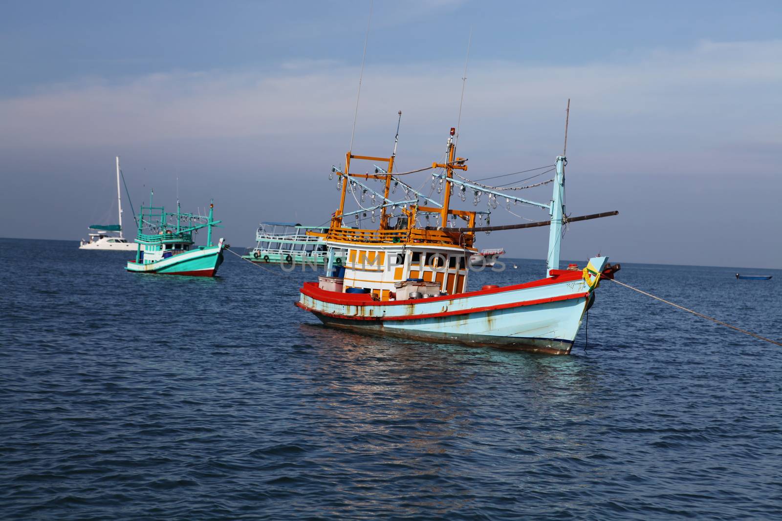 Thai fishing schooner at sea in sunny weather conditions