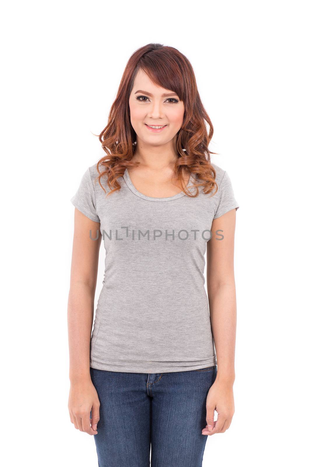 happy teenage girl in blank gray t-shirt on white background