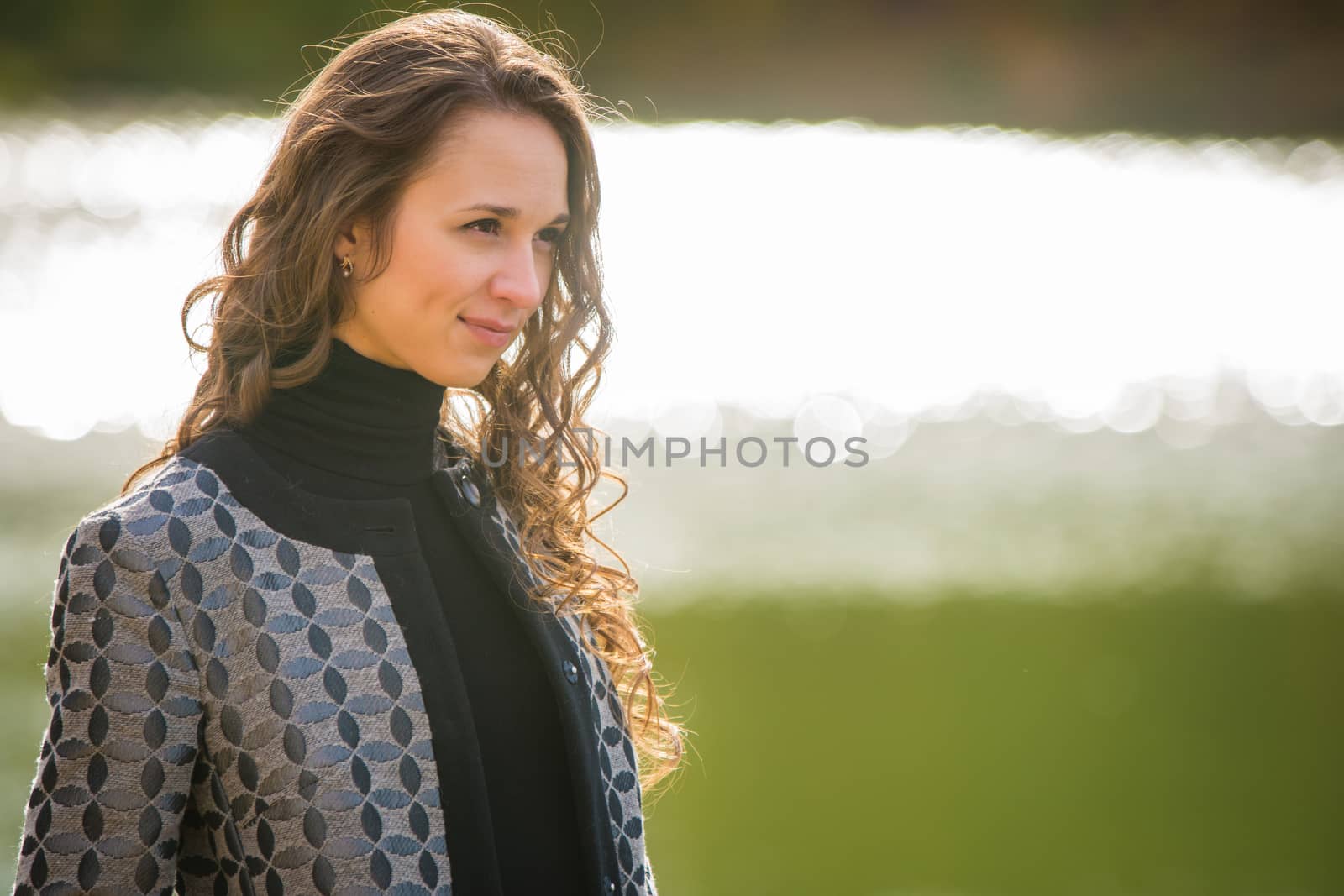 Twenty-five young beautiful girl walks by Europeans autumn forest