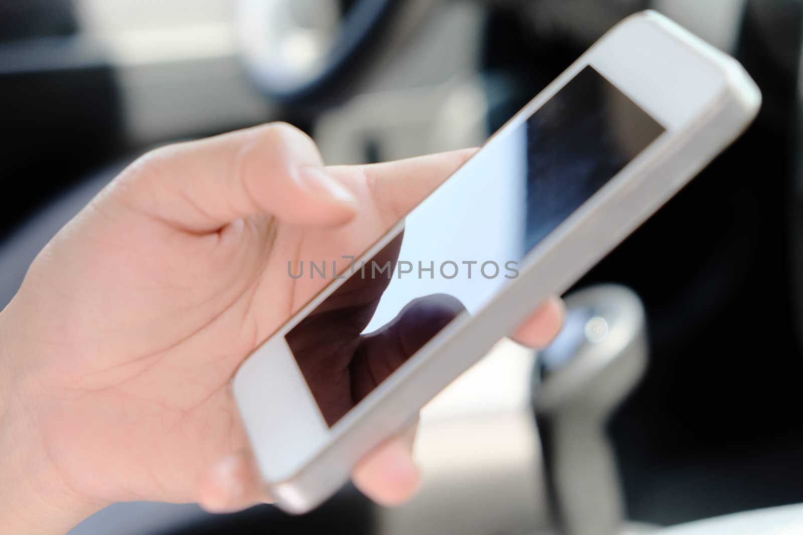 Woman Sitting in the Car and Using Smart Phone