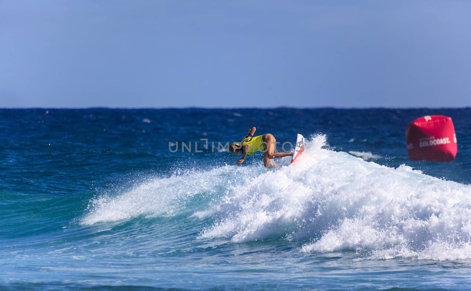 SNAPPER ROCKS, GOLD COAST, AUSTRALIA - 9 MARCH: Unidentified Surfer races the Quiksilver & Roxy Pro World Title Event. 9 March 2013, Snapper Rocks, Gold Coast, Australia