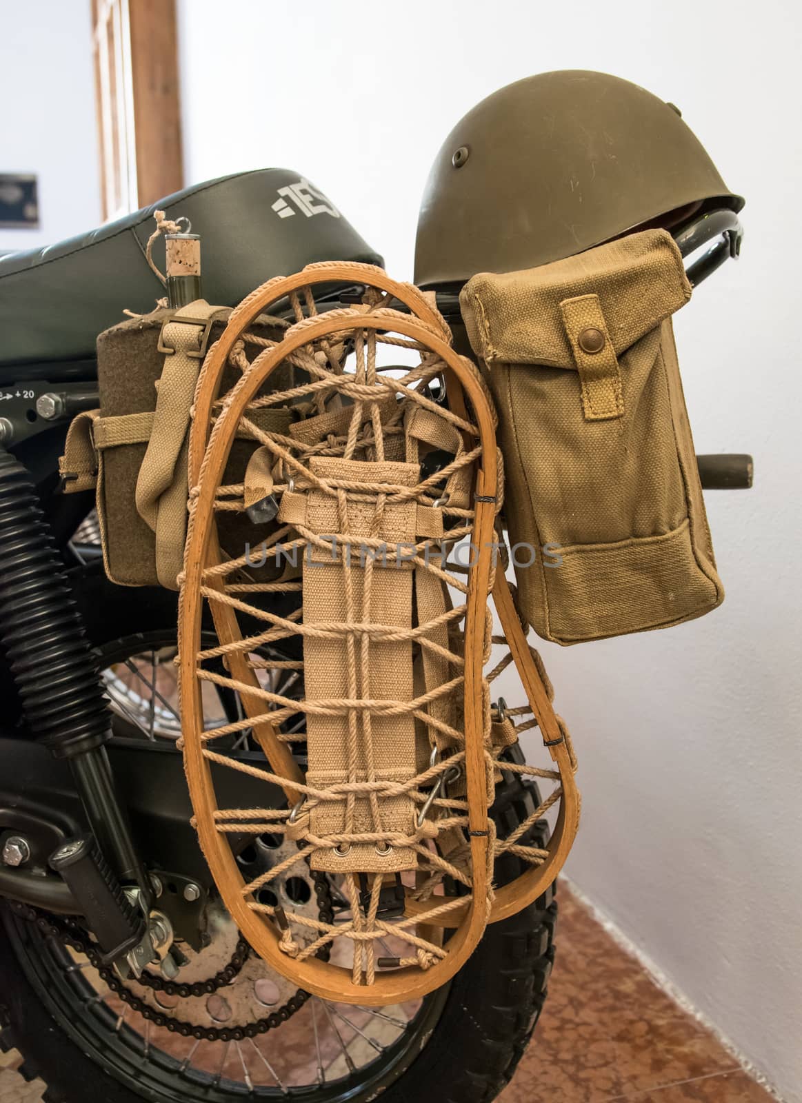 Winter equipment supplied to an old military motorbike.