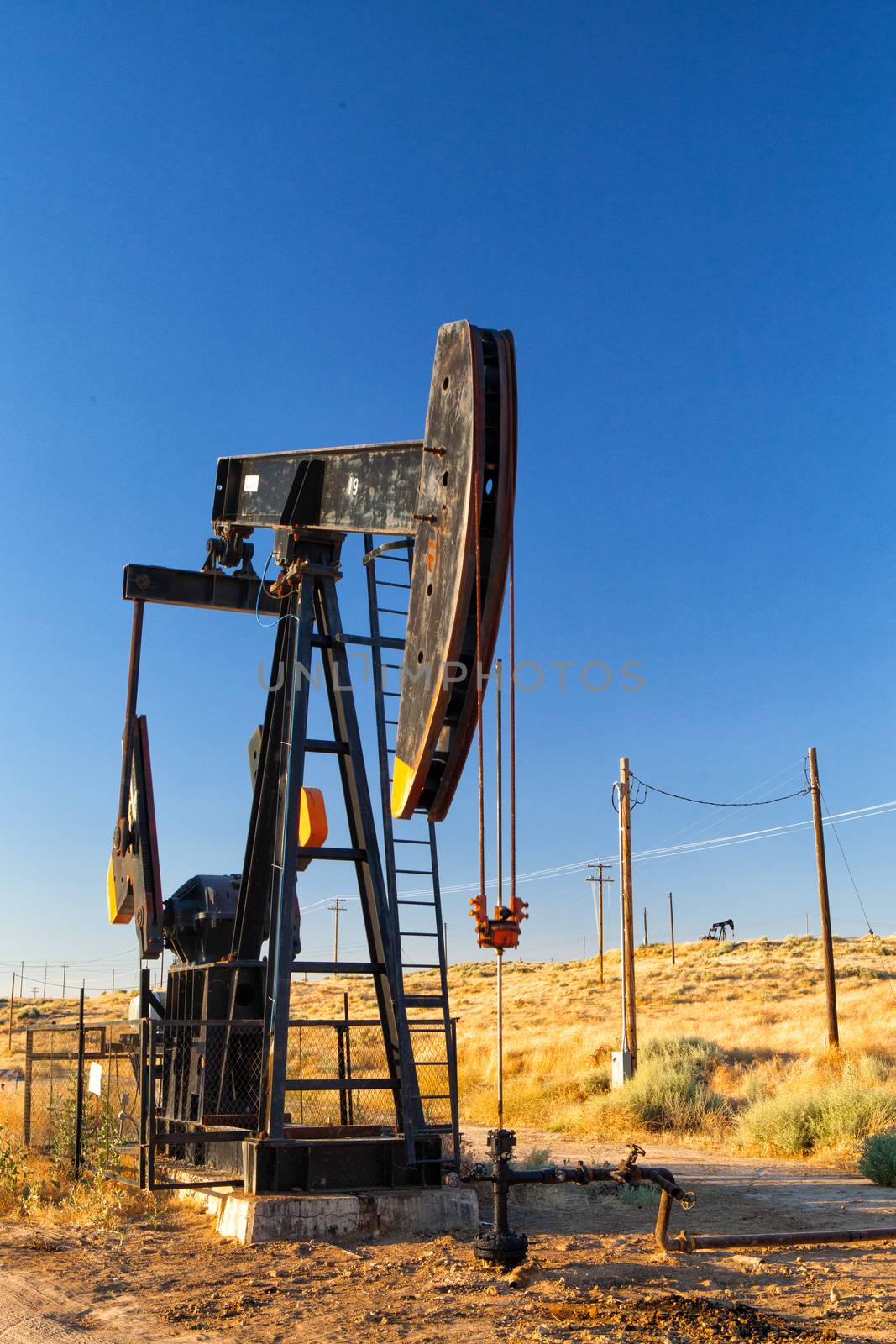 Working oil pump in Nevada desert,  America