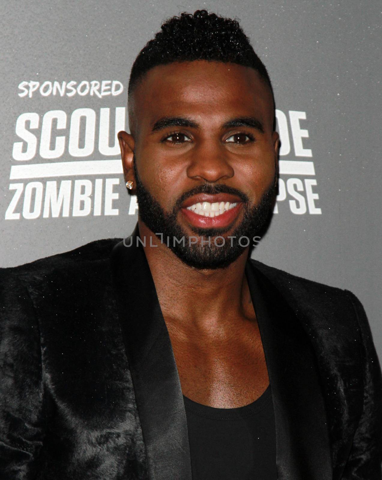 ENGLAND, London: Jason Derulo attended the Kiss FM Haunted House Party in London on October 29, 2015. Costumes ranging from the Rock band KISS to the devil were on display as various stars walked the red carpet at the party which featured musical performances by Rita Ora, Jason Derulo and band Little Mix.