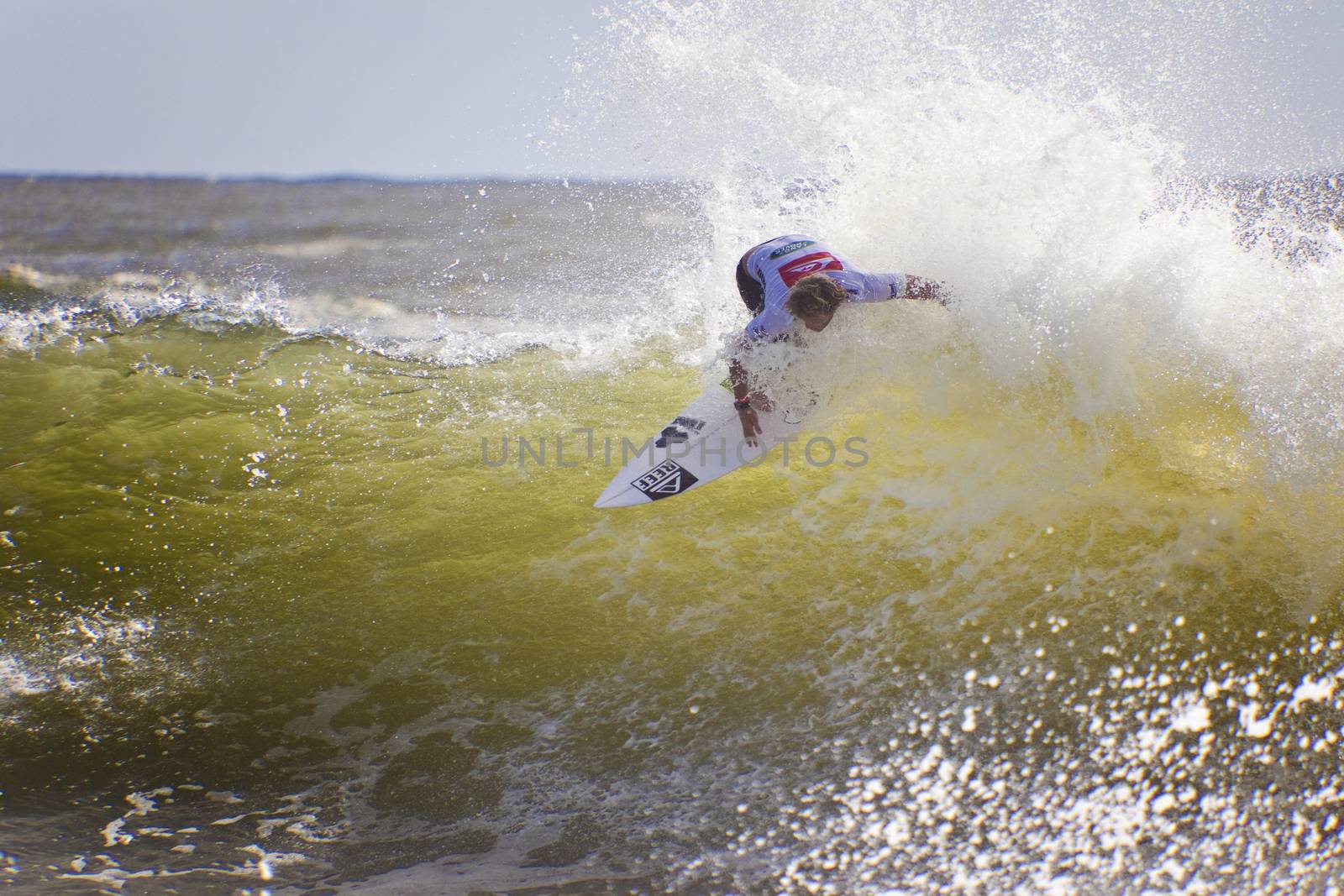 SNAPPER ROCKS, GOLD COAST, AUSTRALIA -FEB 26: Unidentified Surfer walk into the water to races on the Quiksilver & Roxy Pro World Title Event. February 26, 2012, Snapper Rocks, Gold Coast, Australia