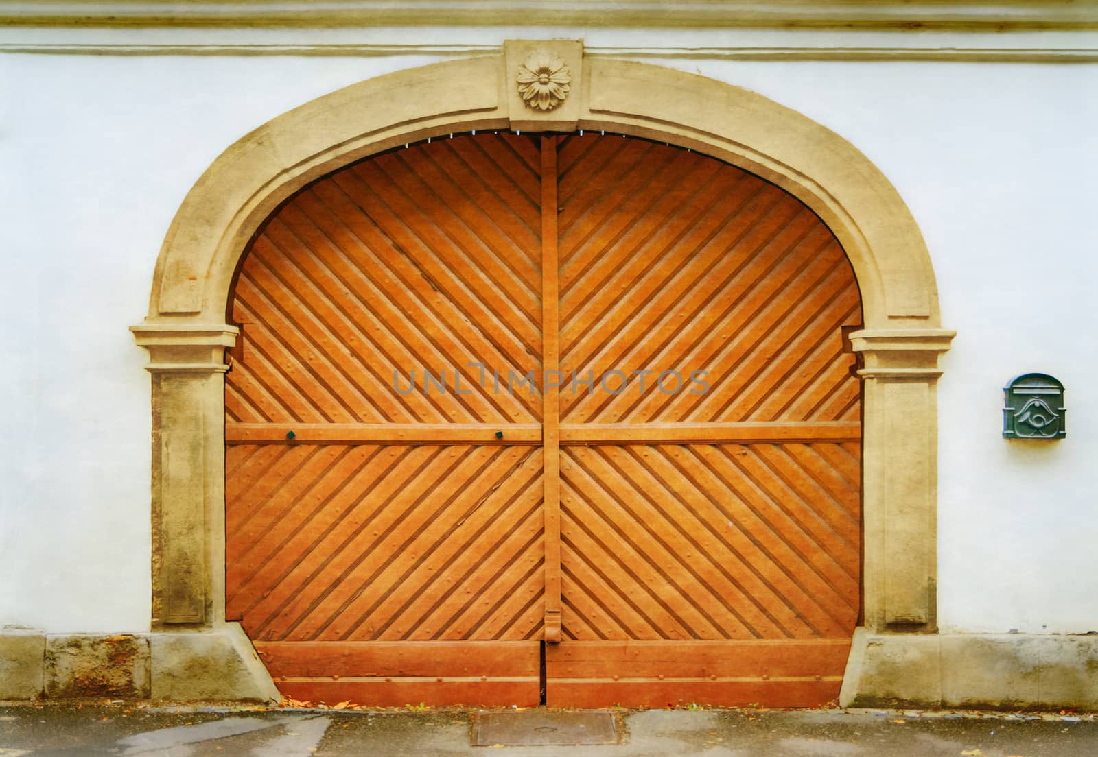 Retro filtered picture of old wooden gate. Photo in old color image style.