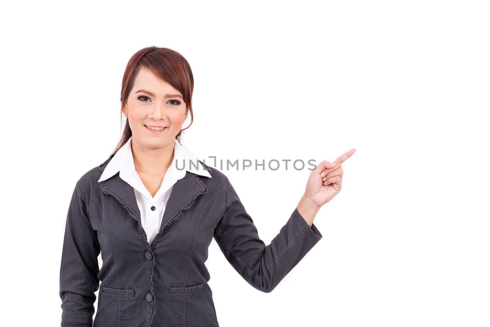 smiling young business woman hand point . suggest work. presentation