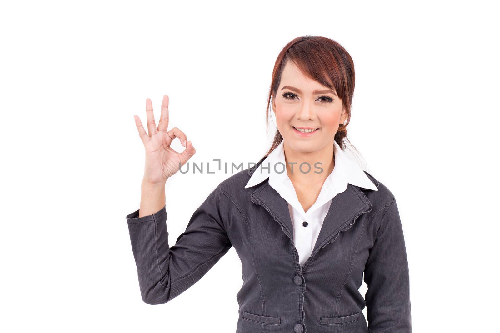 Portrait of a young attractive confident business woman, success, yes, ok, bingo