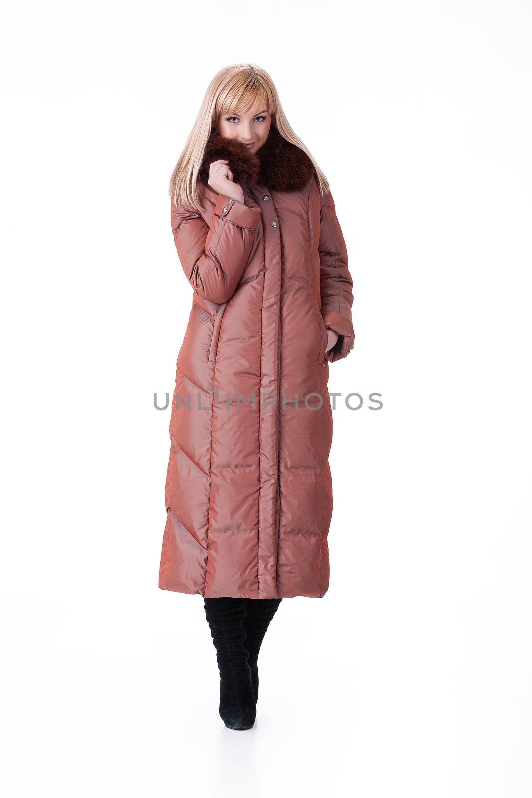 Young attractive woman in fashionable clothing on isolated background