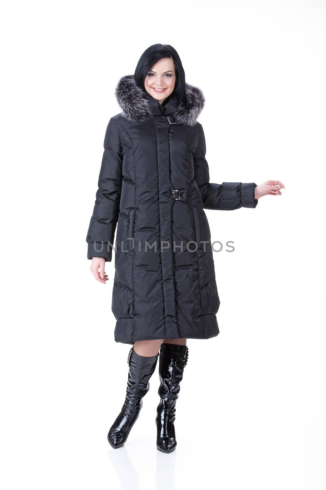 Young attractive woman in fashionable clothing on isolated background