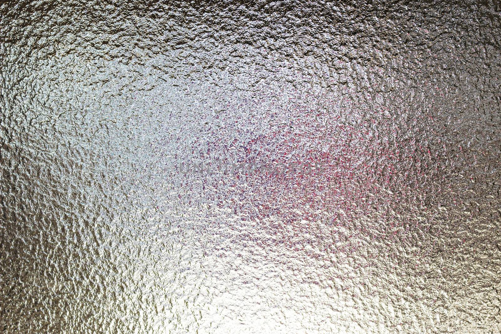 Frosted glass texture. colorful lights background