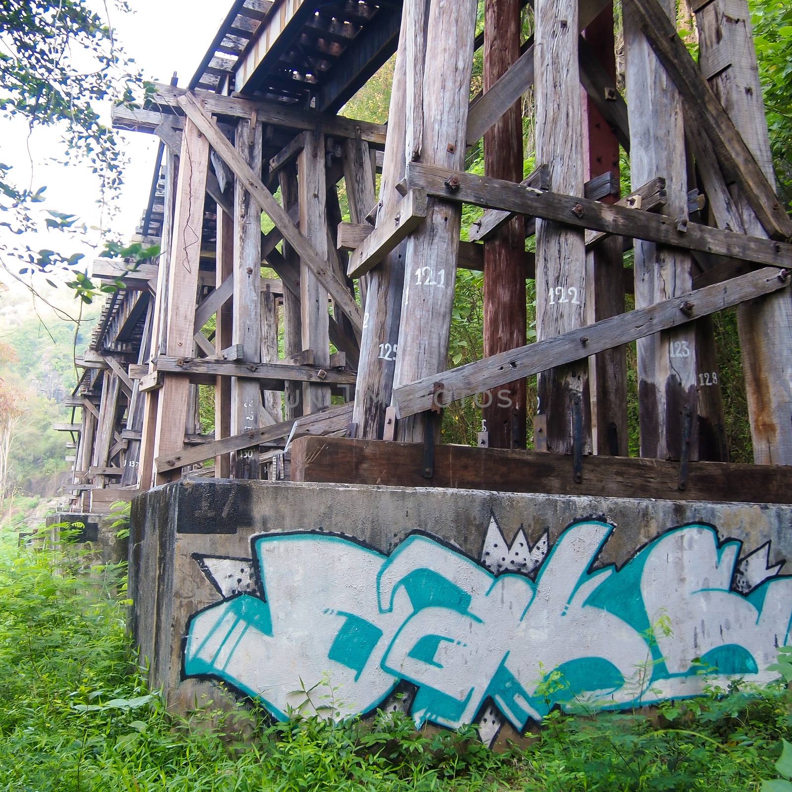 old wood structure of dead railways bridge important landmark and destination of world war II history in kanchanaburi thailand and now is famous visiting point of visitor in thailand