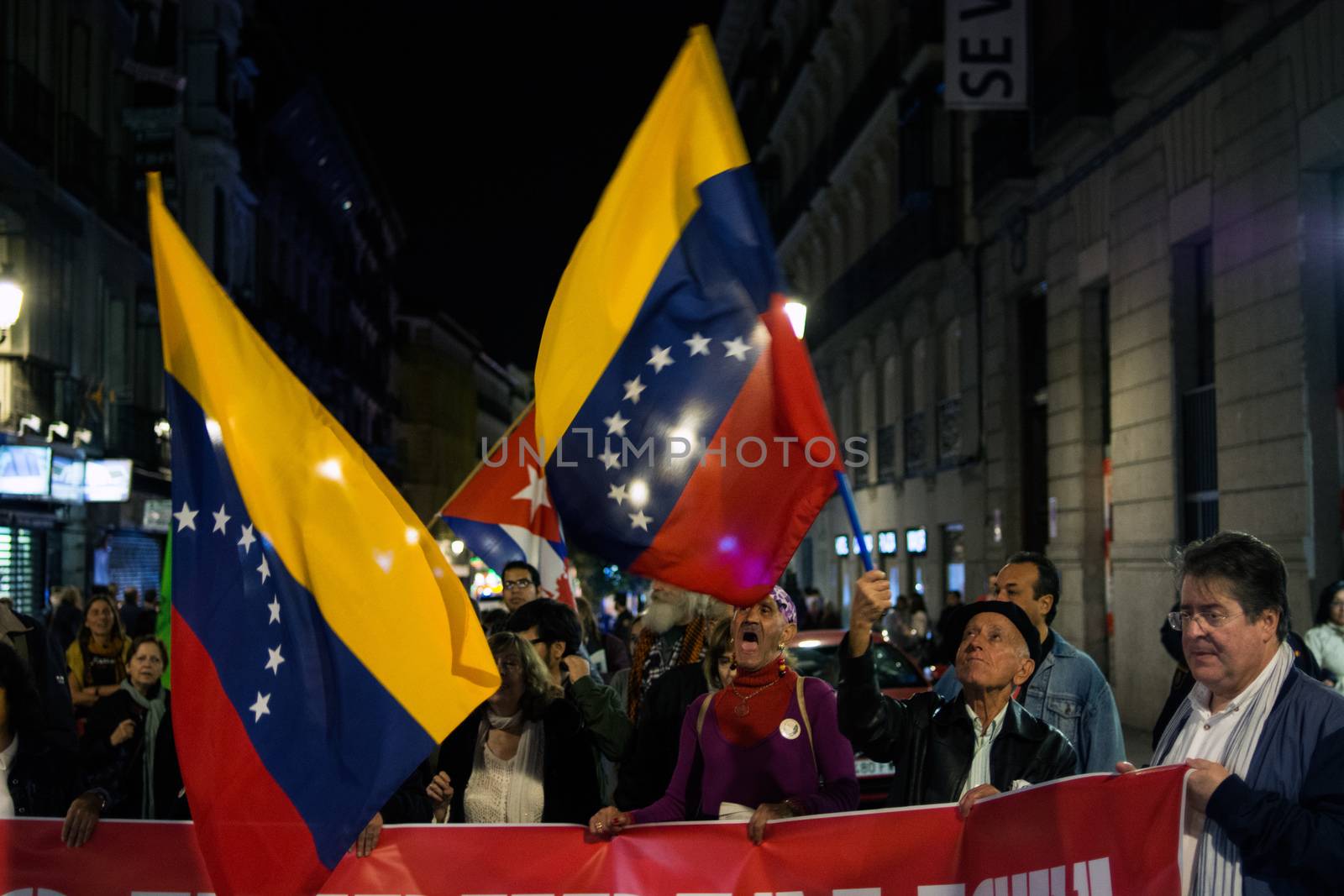 SPAIN, Madrid: People demonstrate in Madrid on October 30, 2015 to protest  against imperialism in Latin America. 