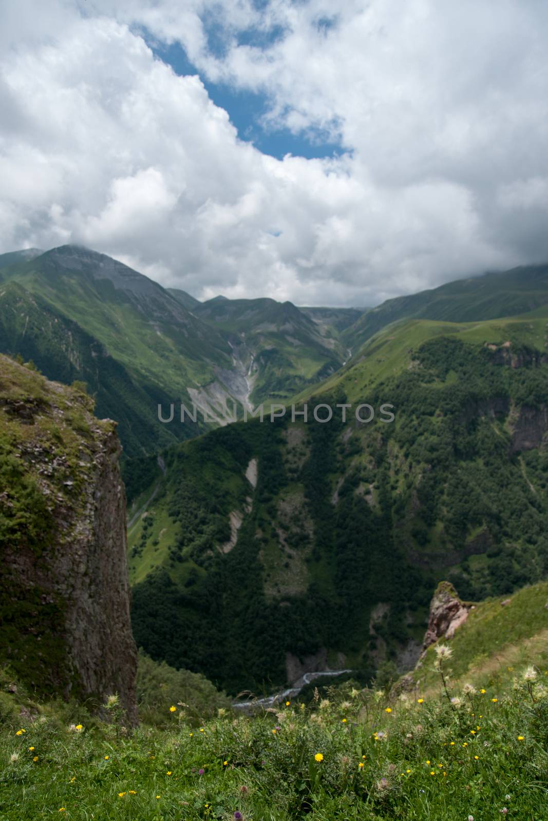 Mountains landscape with green hills and sky for travel and hiking