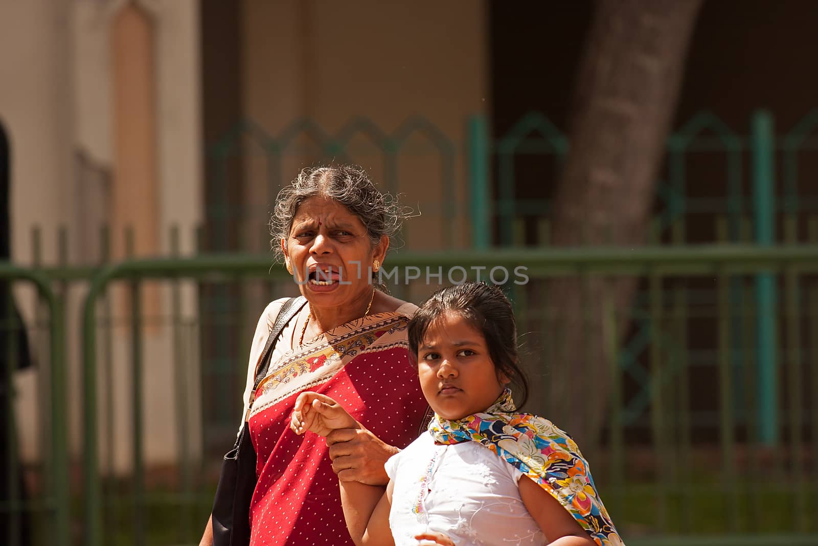 Little India, Singapore - 2008. Old Indian woman with her grandd by kuba61
