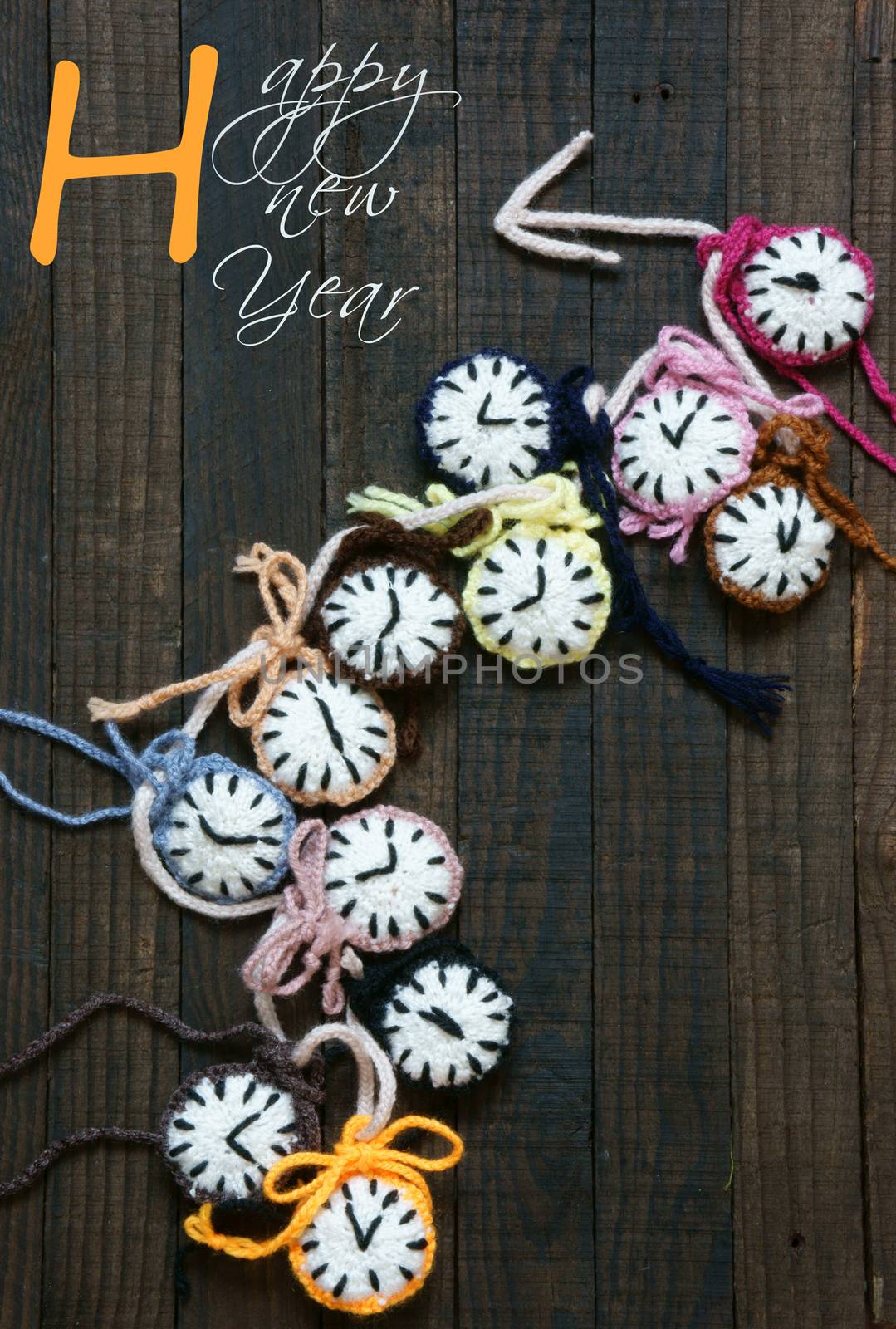 Handmade design from yarn, group of colorful clock with many time zone to happy new year 2016, eve moment, amazing with knitted product on wooden background