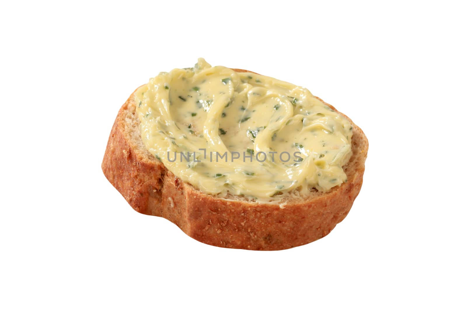 Slice of bread and herb butter - isolated on white