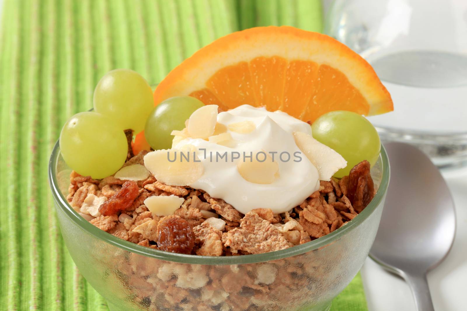 Bowl of breakfast cereals with fruit and quark