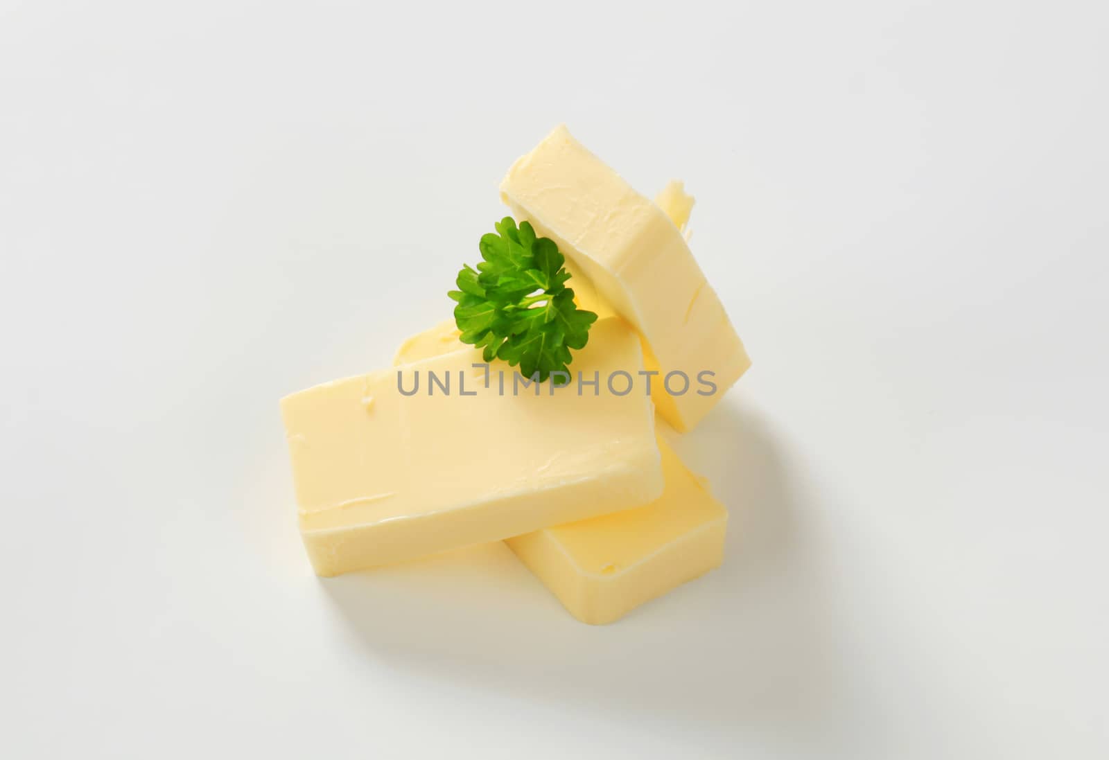 Pieces of fresh butter  - studio shot