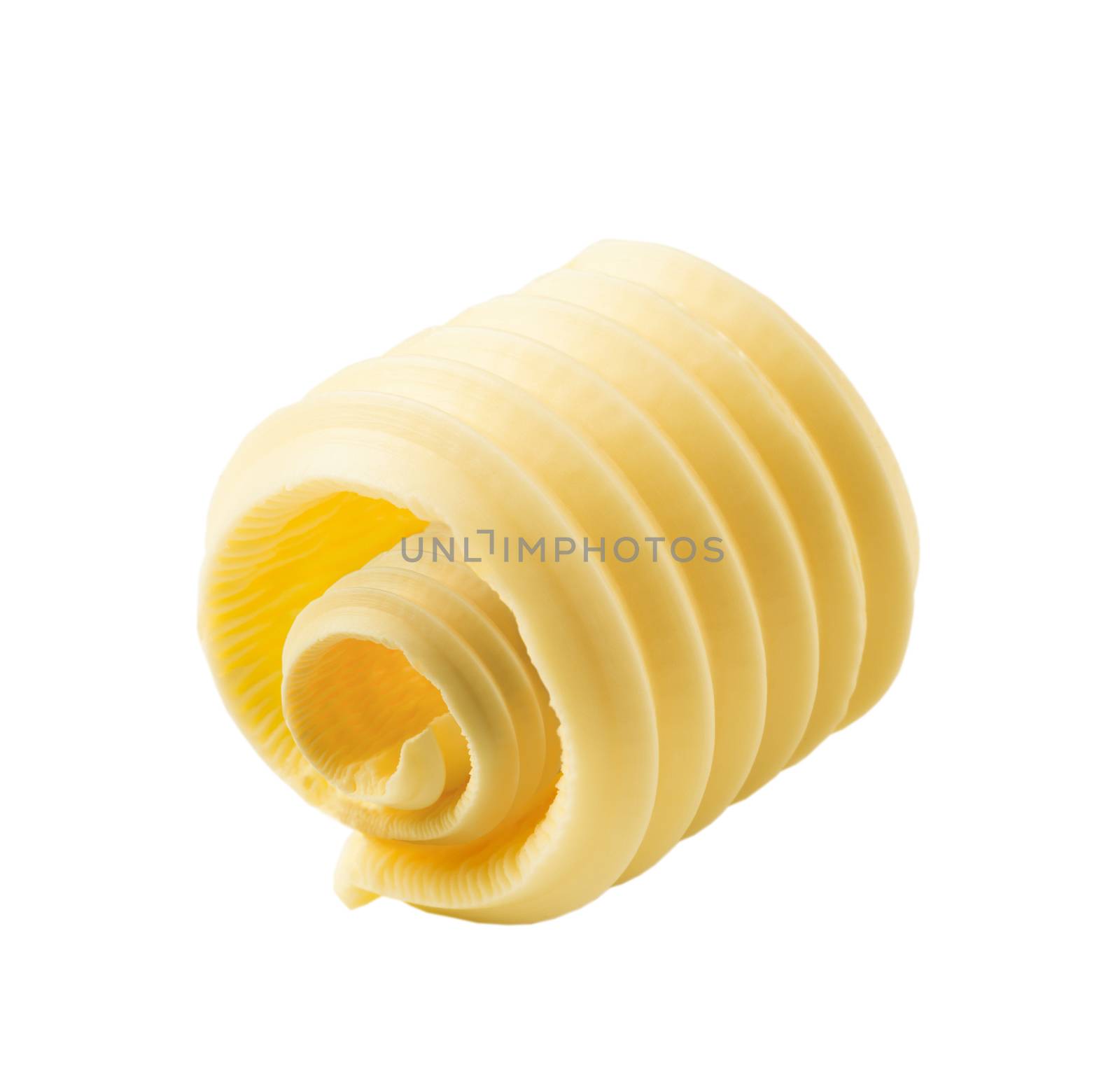 Curl of fresh butter isolated on white