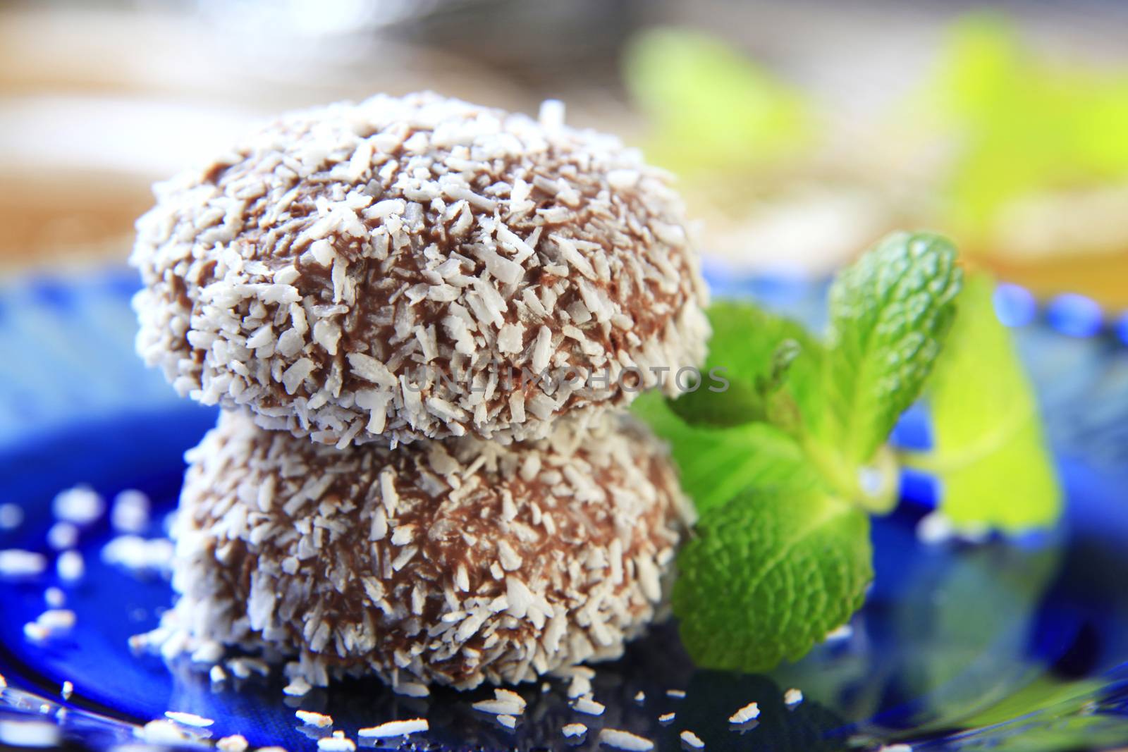Chocolate coconut confections filled with cream
