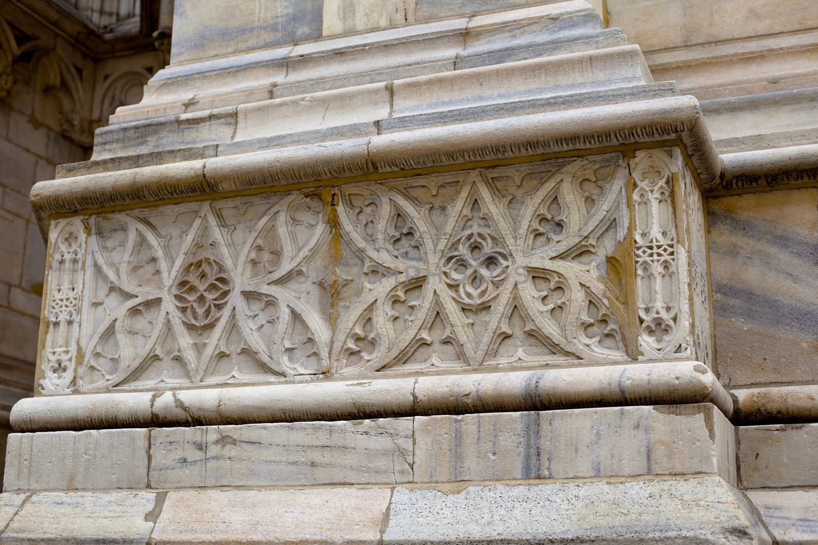 A decoration on famous gothic Milan cathedral in Italy
