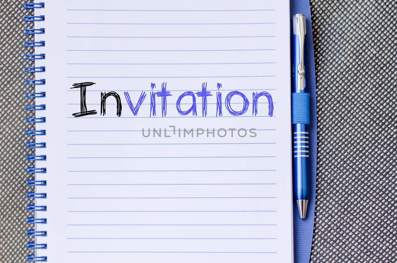 Invitation text concept write on notebook