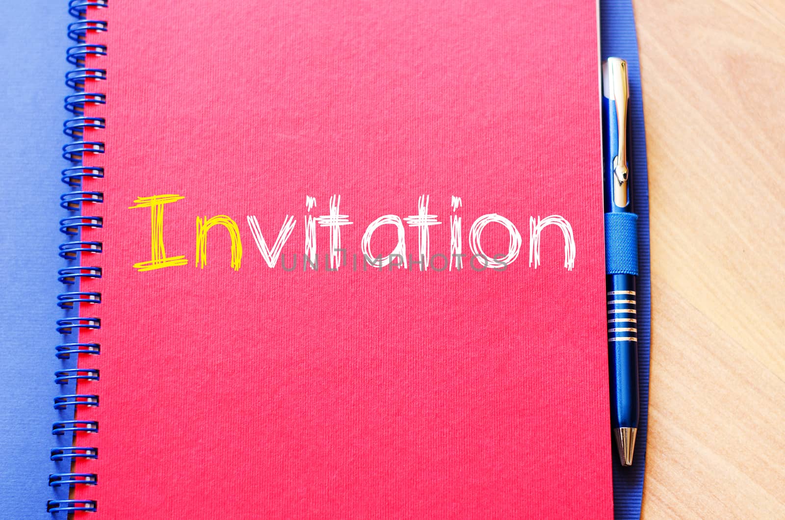 Invitation text concept write on notebook