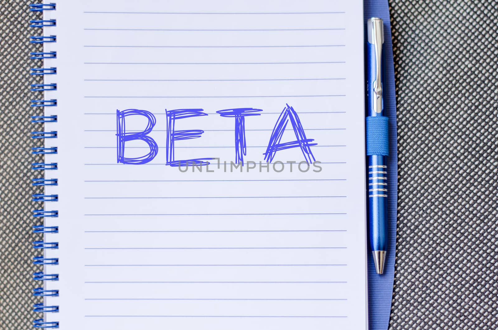 Beta text concept write on notebook