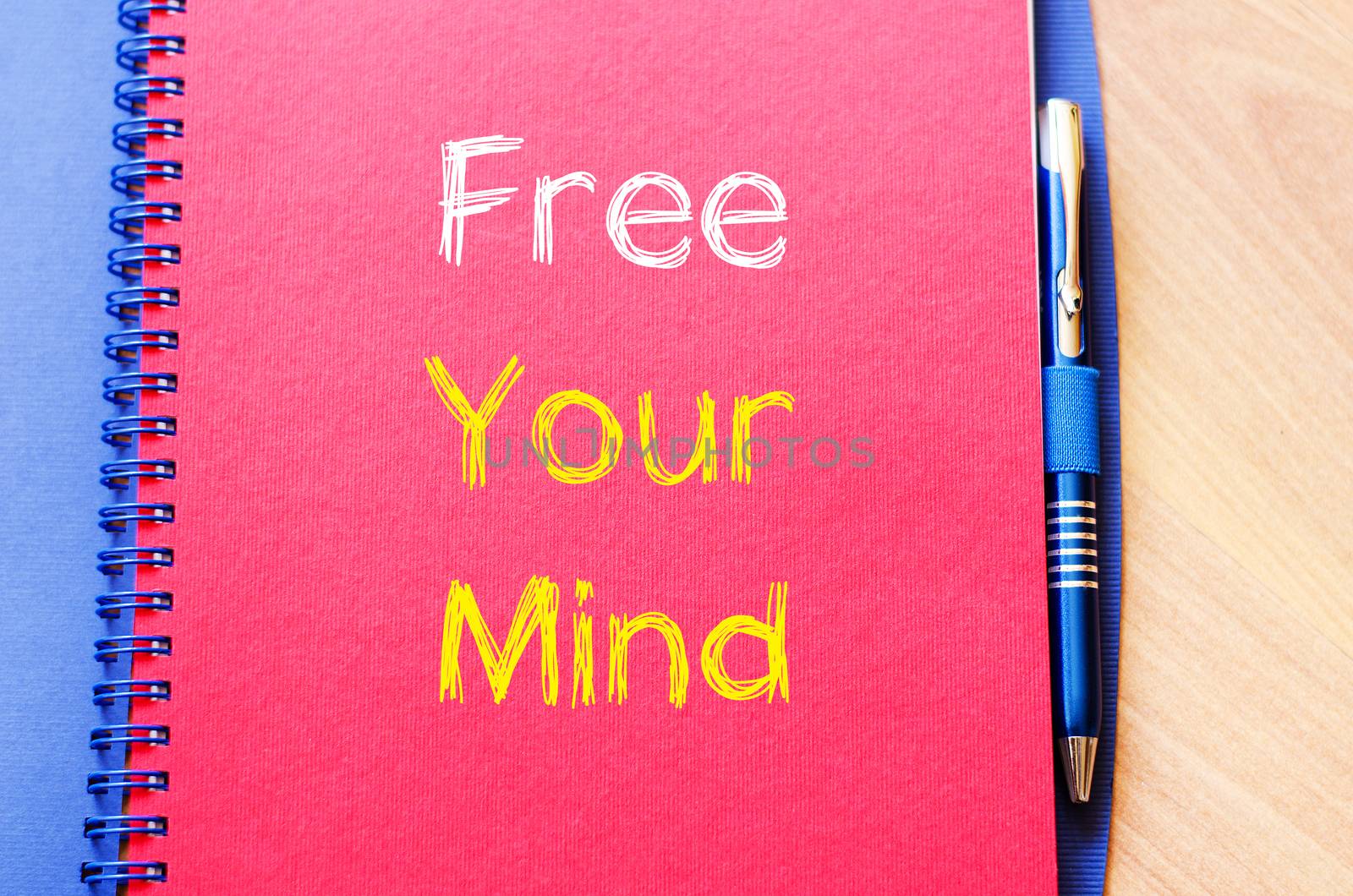 Free your mind text concept write on notebook