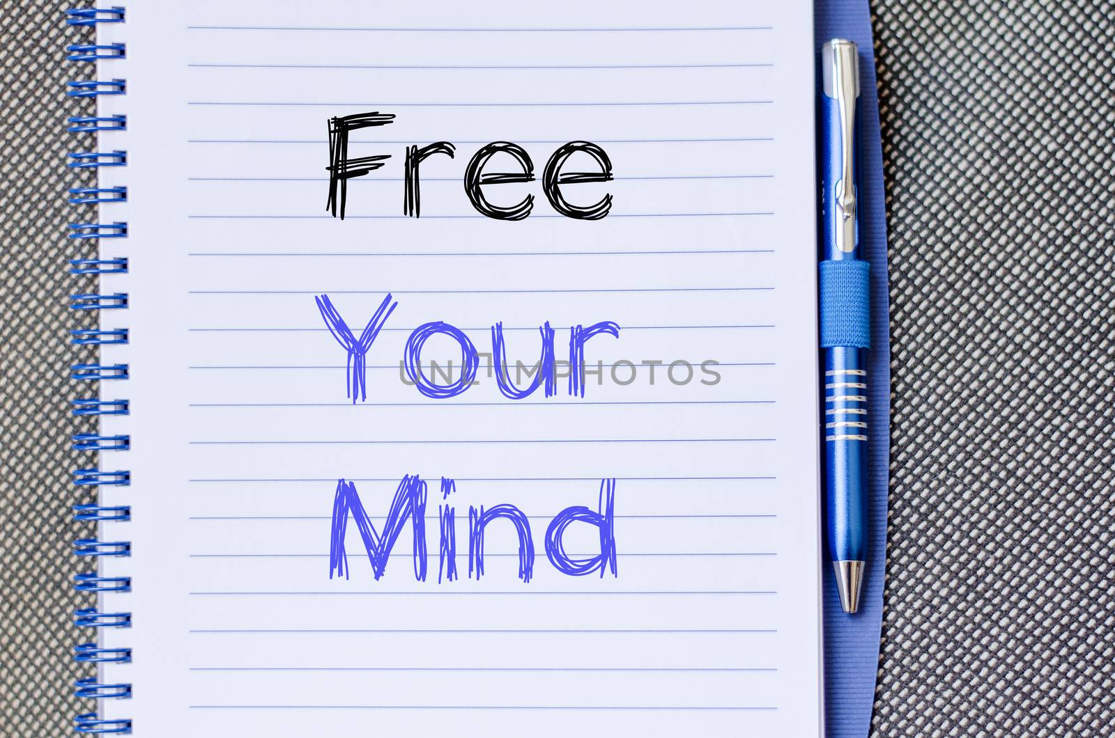 Free your mind text concept write on notebook