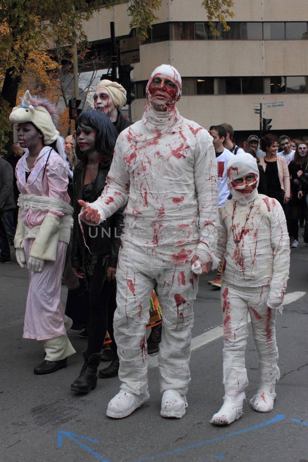 CANADA, Montreal: People disguised in zombies take part in the Zombie Day of Montreal, on October 31, 2015.