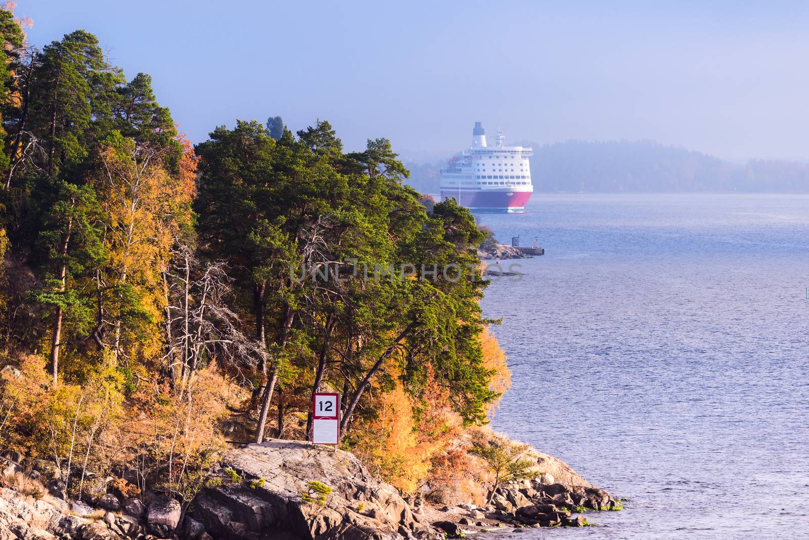 Landscape of Swedish sea fjord and cruise ship