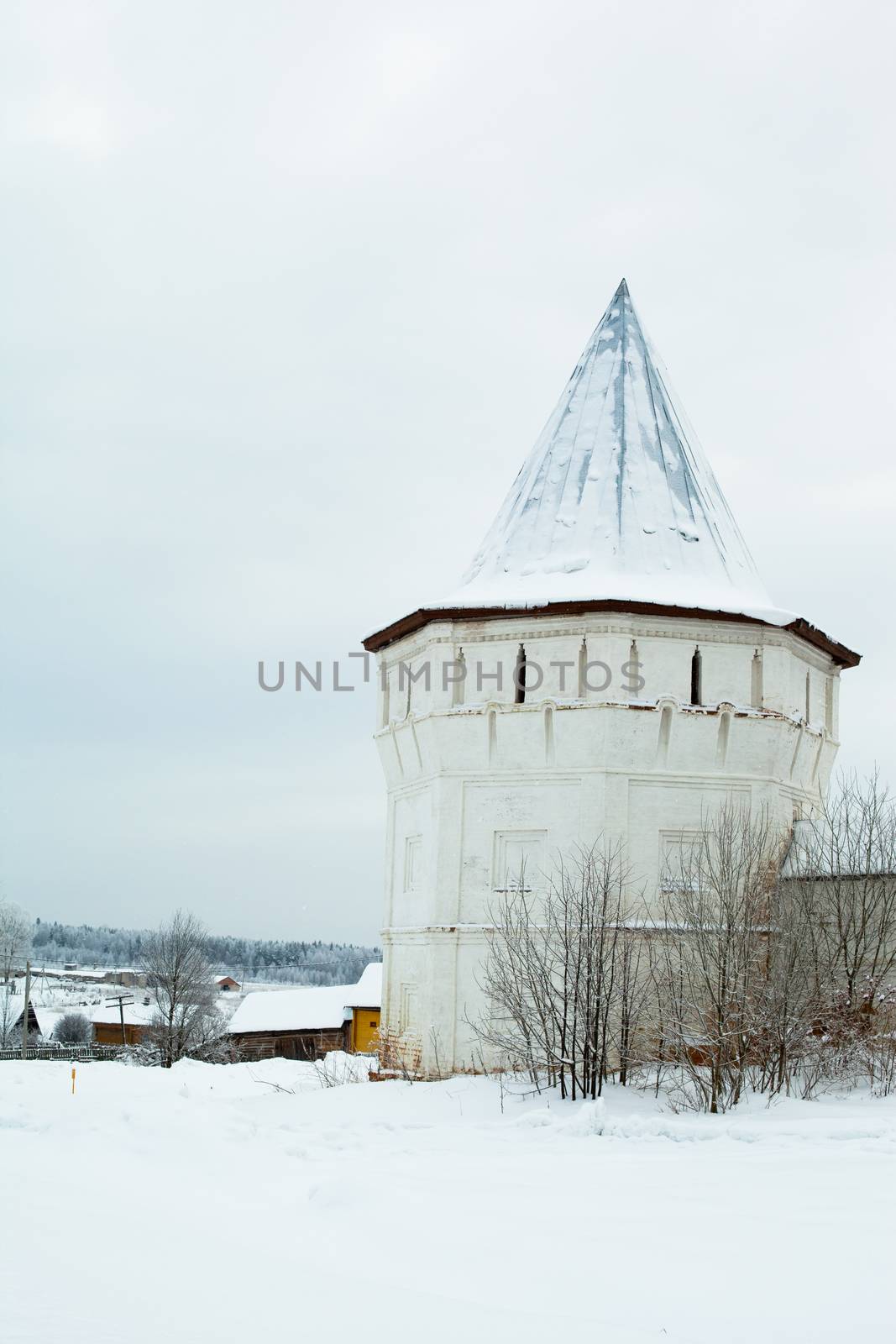 White old tower in winter in Uglich
