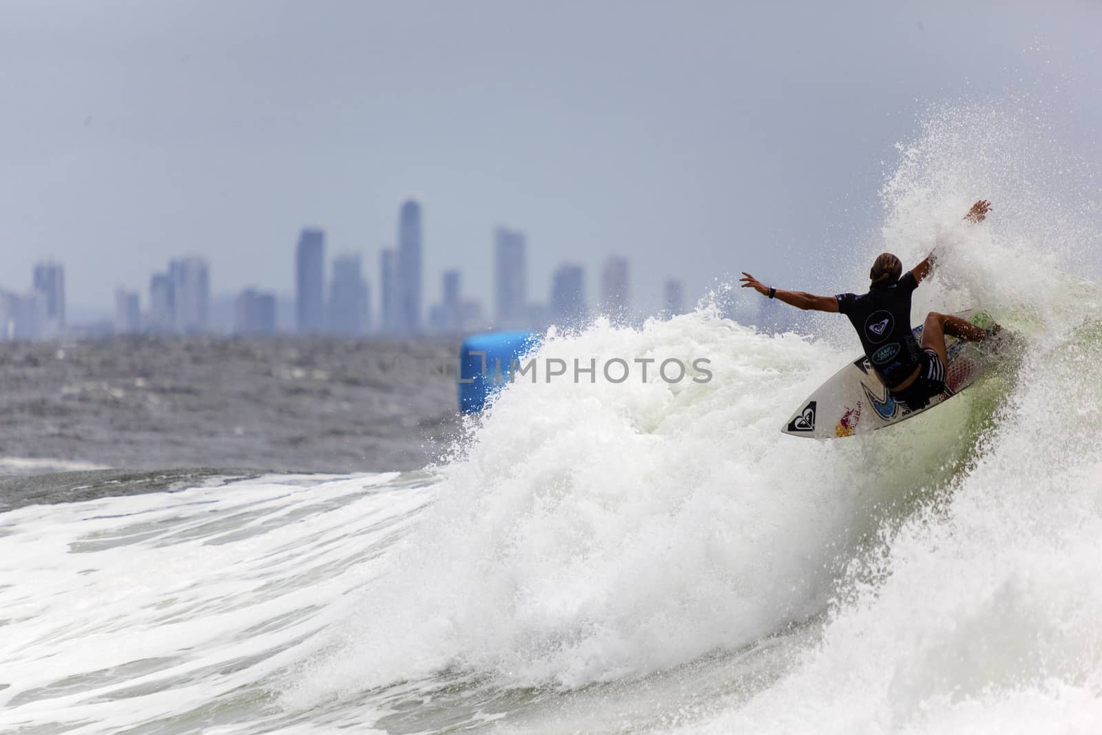 SNAPPER ROCKS, GOLD COAST, AUSTRALIA - 9 MARCH: Unidentified Surfer races the Quicksilver & Roxy Pro World Title Event. 9 March 2013, Snapper Rocks, Gold Coast, Australia